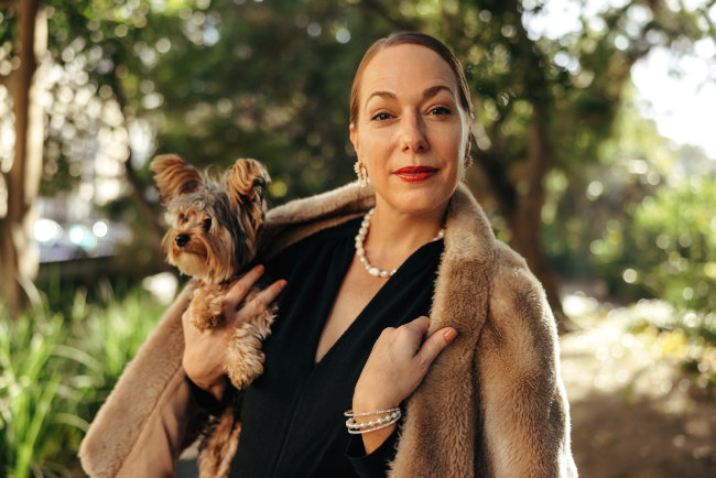 socialite-woman-holding-puppy